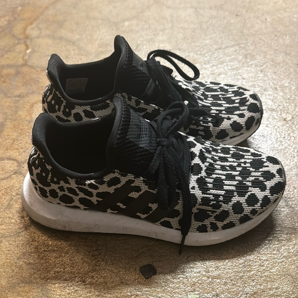 Adidas women size 6 fit like a 7